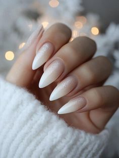 Shine White Nails, White Ombré Christmas Nails, Winter Nails Simple Almond, Nude To White Ombre Nails Almond, Wedding Christmas Nails, Classy Snowflake Nails, Wedding Nails For Bride Winter, Winter Nail Almond, Engagement Christmas Nails