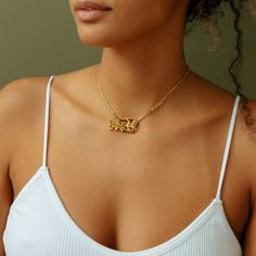 Elevate your style with our Double Plated Name Necklace with a Cuban Chain. This customizable piece can be personalized with letters, numbers, and Roman numerals, making it a unique addition to your jewelry collection.  The Cuban Chain, with a width of 3.7 mm, adds a touch of sophistication to your look. The necklace is equipped with a secure lobster clasp. You can choose your preferred metal from sterling silver, 14k gold plate over sterling silver, or 14k solid gold (for the nameplate only).  This necklace offers a perfect blend of personalization and timeless style. *HOW TO ORDER: Select the color and size of your choice from the drop-down menu. Below it, you will have a personalization box where you can enter your personalization information.  *Caring for Your Jewelry: To maintain the Solid Necklace, Dainty Initial Necklace, Necklace Name, Ring Bracelet Chain, Name Earrings, Engraved Pendant, Herringbone Necklace, Jewelry Post, Photo Pendant