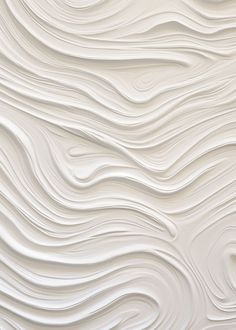 an abstract white background with wavy lines and curves in the form of waves on top of each other