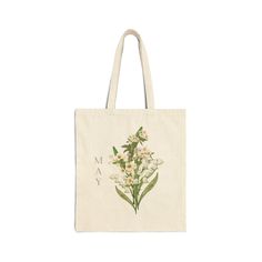 This 100% cotton bag comes in one size - 15" x 16"- perfect for everyday wear. It's durable and will last for years. The bag features 20" handles (made from the same canvas), making it easy to carry even with a week's worth of shopping. .: 100% cotton canvas .: Heavy fabric (12 oz/yd² (406.9 g/m .: Sewn-in label .: Available in natural and black colors - Cute, pretty, beautiful design  - Perfect for a gift May Birth Month Flower, Canvas Making, Birth Month Flower, Month Flowers, Birth Month Flowers, Birth Month, Lily Of The Valley, Canvas Tote Bag, Cotton Bag