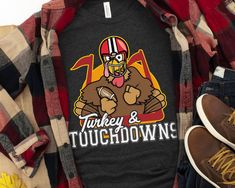 Turkey & Touchdowns Funny Thanksgiving Football Shirt is the perfect Thanksgiving day shirt to complement your Turkey dinner, mashed potatoes, stuffing, yams, pumpkin pie, and a nice glass of wine. Happy Turkey Day America! T-Shirt Details -- Adult-sized shirts are printed on Bella+Canvas 3001 Unisex Tees (unless otherwise noted) - Solid colors are 100% cotton, heather colors are 52% cotton, 48% polyester (Athletic Heather is 90% cotton, 10% polyester) - Pre-shrunk and run true to size. However, Dinner Mashed Potatoes, Thanksgiving Football Shirt, Funny Friendsgiving, Thanksgiving Football, Dinner Thanksgiving, Happy Turkey Day, Fall Football, Turkey Shirts, Perfect Thanksgiving