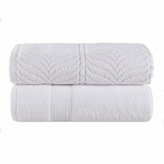 two white towels stacked on top of each other