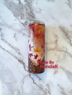 a can of coffee on a marble surface with the words made by rondakk