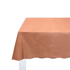 an empty table with a brown cloth on it