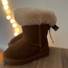 Lam Boots Mid Calf Fur Too With Bow Lacing Up Back Size 8 Bnwot Cute Brown Winter Boots, Trendy Brown Mid-calf Winter Boots, Brown Winter Mid-calf Boots, Luxury Brown Mid-calf Boots, Fitted Brown Suede Mid-calf Boots, Brown Lace-up Boots With Faux Fur Trim, Toddler Boots, Mid Calf, Kids Shoes