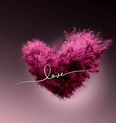 a pink heart with the word love written on it