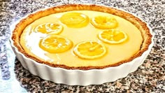 there is a pie with lemons on it