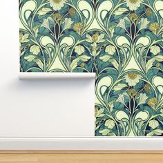 the wall paper is designed to look like an art deco design with flowers and leaves