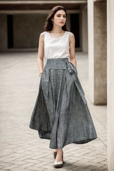 Discover the sophistication of our Grey Linen wrap skirt, perfect for both casual outings and lively nights.This dress can be worn for many occasions and is very casual and comfortable without being too elegant! ★★FEATURES 50% linen, 50% Cotton No lining Two side pockets Inside Button Asymmetrical skirt Wrap skirt Skirt with tied Pleated skirt Regular fit skirt A Line skirt Perfect for Summer, Spring, Autumn ★★ Bespoke Order Service If you Request other color Request the length Your height is not between 155 cm- 172 cm Your weight is over 75 kg I can do it for you, It will need some extra fee depending on on your need. Contact with me for more detail. ★★ Get your size in Size Chart with your body measurement https://www.etsy.com/listing/794055682 ★★ Warmly Note: 1 ) : Please confirm your s Smart Casual Skirt, Cotton Skirt Outfit, Asymetric Skirt, Linen Dresses Summer, Linen Wrap Skirt, Linen Style Fashion, Linen Maxi Skirt, Skirt Asymmetrical, Skirt A Line