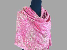 Soft and Warm Shawl embellished with silk thread embroidery. Shawls for Women which are perfect for all 4 seasons. Super soft and cozy. A must have accessory that can be used year long for elegant and classy look on any occasion.   * Can be draped in multiple ways.  * Use it as a lightweight, warm & soft throw indoors as well as a Travel Blanket Outdoors. Makes a great GIFT too ! Get creative for the endless options!  ~ Material: Fine Wool ~ Work: Fine silk, hand assisted crewel embroidery, Rhinestone Embellishments. ~ Care: Steam Iron and & Dry clean only. Disclaimer: Due to different color settings for different monitors, colors may vary slightly from one computer to another. We strive to make our colors as accurate as possible. Silk Thread Embroidery, Braided Scarf, Shawl Wedding, Wool Work, Paisley Shawl, Warm Shawl, Kashmiri Shawls, Silk Scarf Hair, Large Silk Scarf