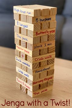 a stack of wooden blocks sitting on top of a table