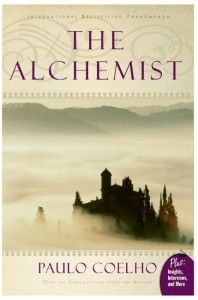 the alchemist book cover with an image of a castle in the foggy sky