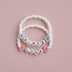 three bracelets with words that spell out the word'bake duna '