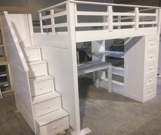 a loft bed with drawers underneath it and stairs leading up to the top bunk area