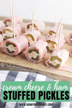 small appetizers with toothpicks in them on a cutting board and text overlay