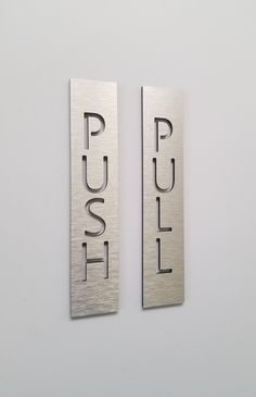 two metal plaques with the words paul and paul on them