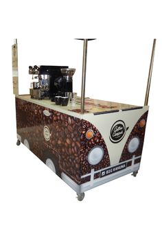 an ice cream truck with coffee beans painted on it's side and wheels, sitting in front of a white background