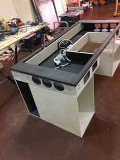 a stove top oven sitting inside of a kitchen