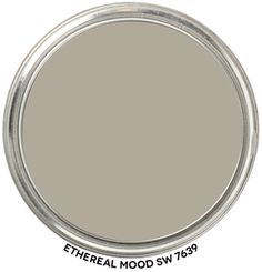 the ashley gray color is shown in an oval tin with white lettering on it