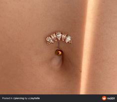 an image of a woman's breast with three diamonds on it