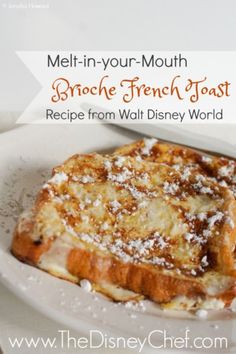 a white plate topped with french toast covered in powdered sugar