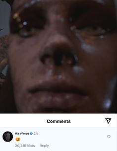 the face of a man with mud all over his eyes and nose is shown in this screenshot