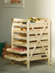 a wooden crate filled with fruits and vegetables