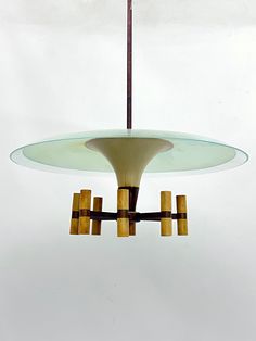 an unusual light fixture hanging from a ceiling