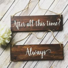 two wooden signs that say, after all this time? and always