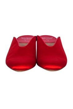 Take the holidays to new heights with these Laurence Dacade red satin mules! Featuring a rounded toe silhouette and statement block heel, these elegant heels will add a splash of festive color to any ensemble. Be a showstopper in these sassy holiday stunners! Size 10 (IT 40) Made in Italy Satin upper Lather sole and lining Slip on Round toe Block heel Comes with box and dust bag Heel height 2.5" Chic Mules With Red Sole, Red Block Heels For Formal Occasions, Red Summer Mules With Sculpted Heel, Red Pointed Toe Mules For Evening, Chic Red Mules With Sculpted Heel, Red Low Heel Block Heels For Formal Occasions, Chic Red Sandals With Contrasting Heel Counter, Red Evening Sandals With Deep Heel Cup, Chic Red Sandals With Contrasting Heel