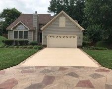 a large driveway in front of a house