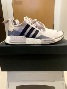 Adidas NMD R1 Orchid Tint (Womens)  Size 7 Orchid Tint/Black EE5176 Thank you for checking my page. A collector and items are 100% guaranteed authentic or your money back. This is a must for die-hard Adidas NMD R1 collectors/sneakerheads. These are NOT FAKES!  These are PRE-OWNED with original box purchased online (Adidas store). Rare colorway.  Please for all customers’ protection, I request my customers to: -Have a confirmed address or be verified by PayPal. -Contact me before buying if you have less than 5 feedbacks.   Shipping -I will box and use packing paper if needed to secure and protect your purchases. -Will use USPS Priority with delivery confirmation. Packed securely to protect your purchased item. Handling cost includes insurance. -Will ONLY ship to a confirmed domestic address Adidas Store, Packing Paper, Adidas Nmd R1, Nmd R1, Adidas Nmd, Die Hard, Sneaker Head, Online Purchase, Original Box