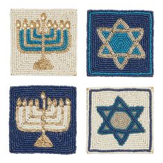 four different types of beaded coasters with menorah symbols on them