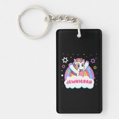 a keychain with an image of a unicorn on the front and rainbow in the back