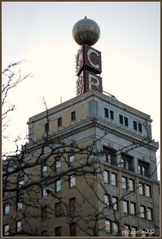 a tall building with a large clock on top