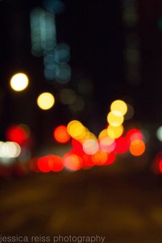 blurry photograph of street lights at night