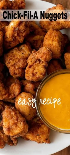 chicken nuggets on a plate with dipping sauce