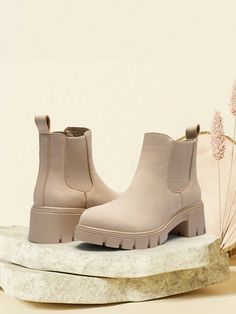 ✔ The Chelsea boots is made of material which is delicate and rich in gloss.✔ The durable TPR rubber sole is strong to elastic, making it more comfortable to wear; Strong grip, good anti-skid performance, improve the comfort of walking.✔ The retro and fashionable Chelsea boots for women; elastic design for easy-to-wear and the wraps design at ankle just right, help you dress a daily outfit easily for refined and elegant personal style.✔ Slip on design with good quality elastic band on both sides of the shoe for easy on and off. Soft lining makes walking more comfortable, even if you go shopping for a long time.✔ Women's ankle boots are quite versatile which can be matched different clothing and pants, including jeans, casual pants, suits, which can well modify your leg shape and show your Fitted Beige Mid-calf Boots For Winter, Trendy Beige Mid-calf Boots For Winter, Beige Boots With Zipper Closure For Fall, Fall Ankle-high Chelsea Boots With Textured Sole, Fall Chelsea Boots With Padded Ankle And Round Toe, Trendy Chelsea Boots With Round Toe For Spring, Beige Round Toe Martin Boots For Fall, Beige Ankle Chelsea Boots For Fall, Beige Mid-calf Boots For Winter
