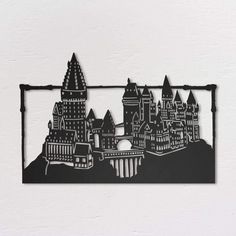 a black and white drawing of a castle