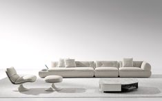 a modern living room with white furniture