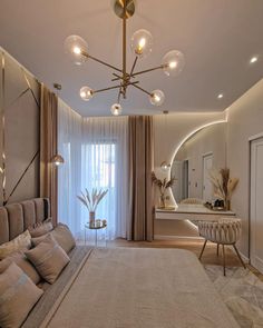 a living room with a couch, mirror and lights on the ceiling in it's center