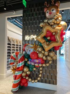 a large balloon decoration in the shape of a christmas tree