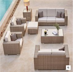 an outdoor patio furniture set is shown with beige and white cushions on the couches