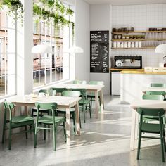 an empty restaurant with tables and chairs