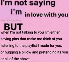 a pink poster with the words i'm not saying i'm in love with you