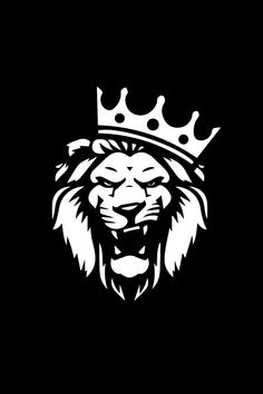 a black and white lion with a crown on it's head in the dark