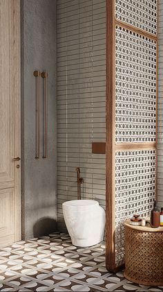 the bathroom is decorated in white and brown with an interesting pattern on the tile floor