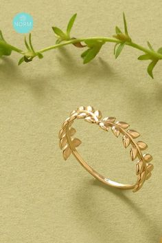 Adorn your fingers with the timeless elegance of our Laurel Wreath Curve Ring. Inspired by nature's grace, this exquisite piece adds a touch of sophistication to any ensemble. 🌿💍✨ Laurel Wreath Ring, Gold Laurel Wreath, Wreath Ring, Curve Ring, Laurel Wreath, Gold Decor, Ring Collections, Real Gold, Timeless Elegance