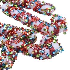 multicolored beaded necklace on white background