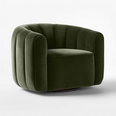 the green chair is sitting in front of a white background